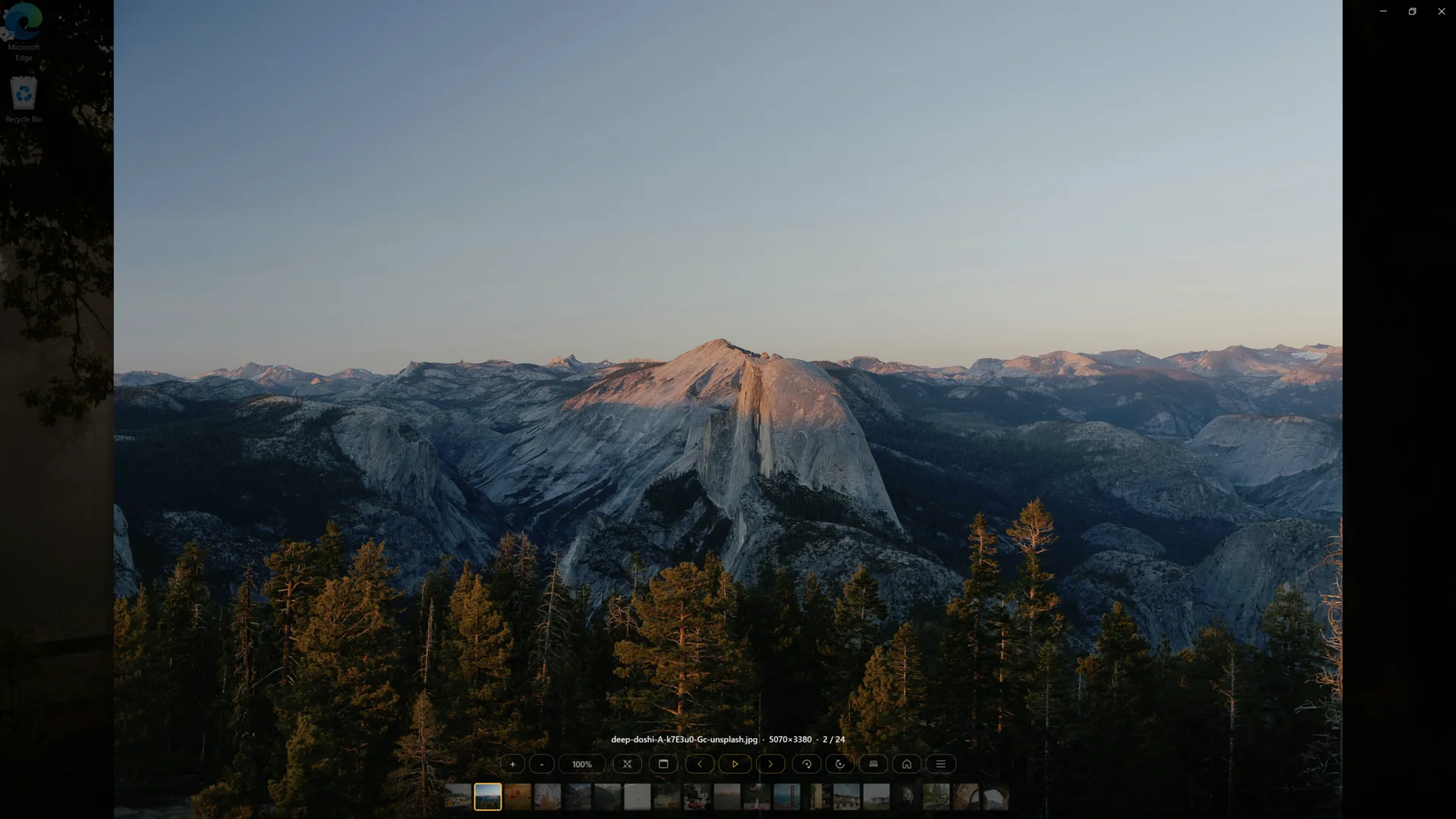 Ember in fullscreen mode showing a landscape edge-to-edge with a minimal centered overlay