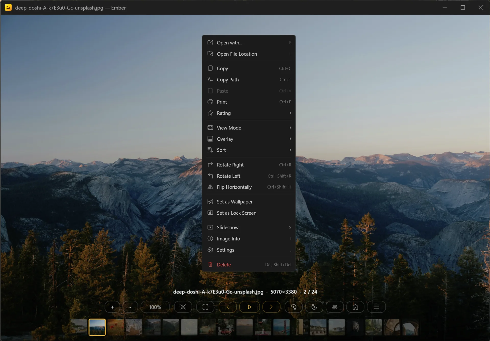 Ember context menu open over an image, listing rotate, rating, wallpaper, slideshow and other commands